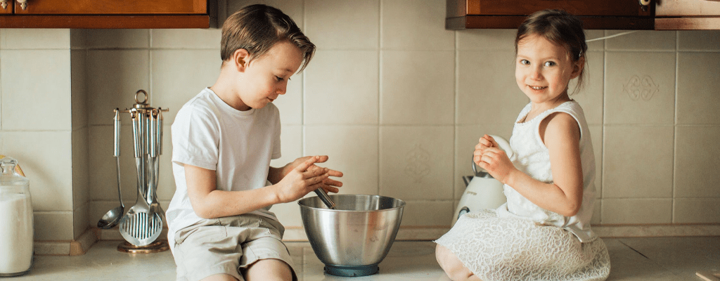 children helping with baking preparations