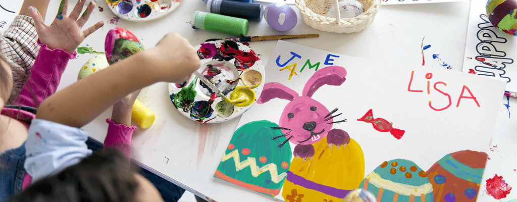 children painting during arts class