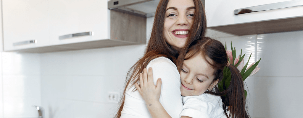 mother comforting child during lockdown